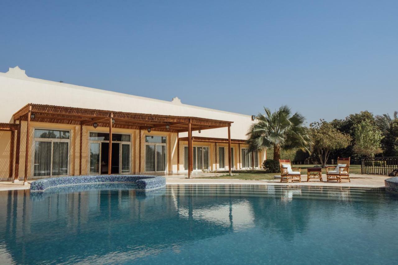 Jolie Ville Hotel & Spa Kings Island Luxor Kültér fotó The resort's swimming pool